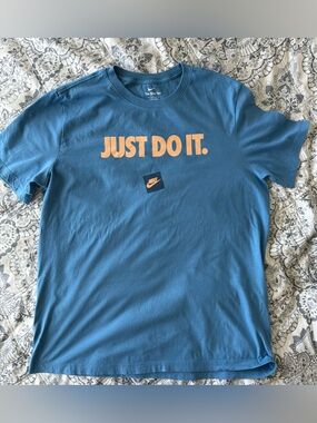 Nike Blue Short-Sleeve 'Just Do It.' Logo Tee with Orange Print